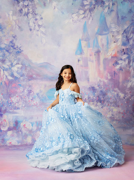Atlanta dream dress photographer, portrait of child in blue dress on princess backdrop