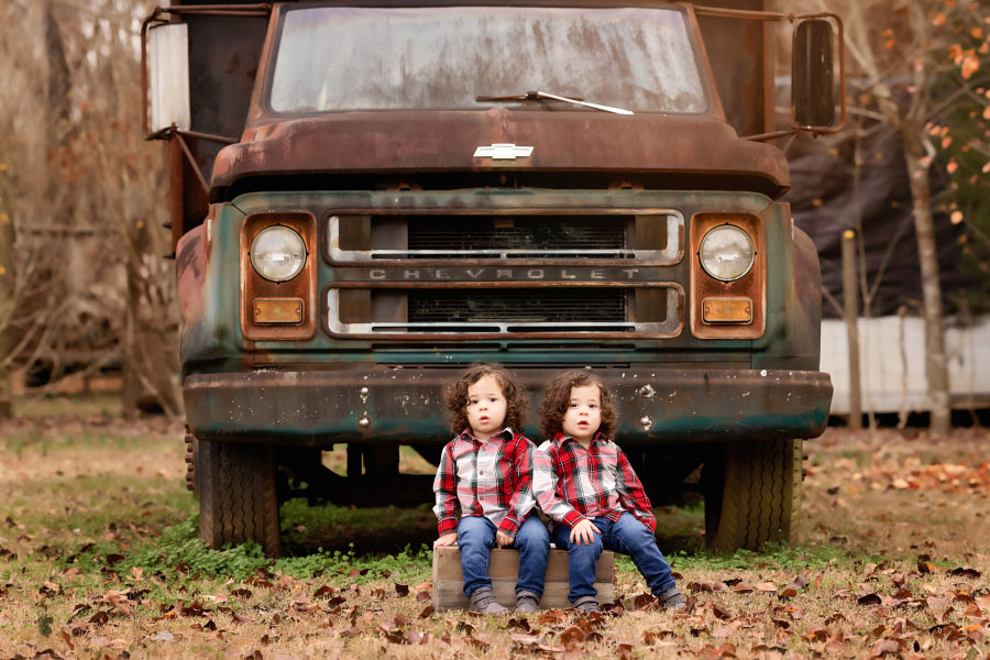 baby photographer near Dallas, GA; twin boys with vintage dump truck