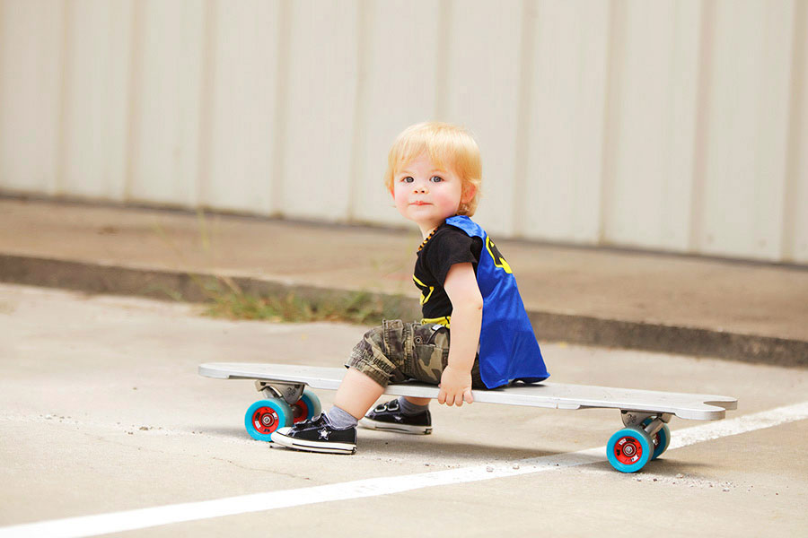 baby photographer near Villa Rica, boy sitting on skateboard
