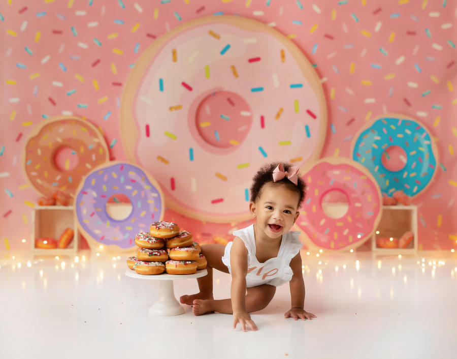 Carrollton cake smash photographer in Georgia, pink donut set