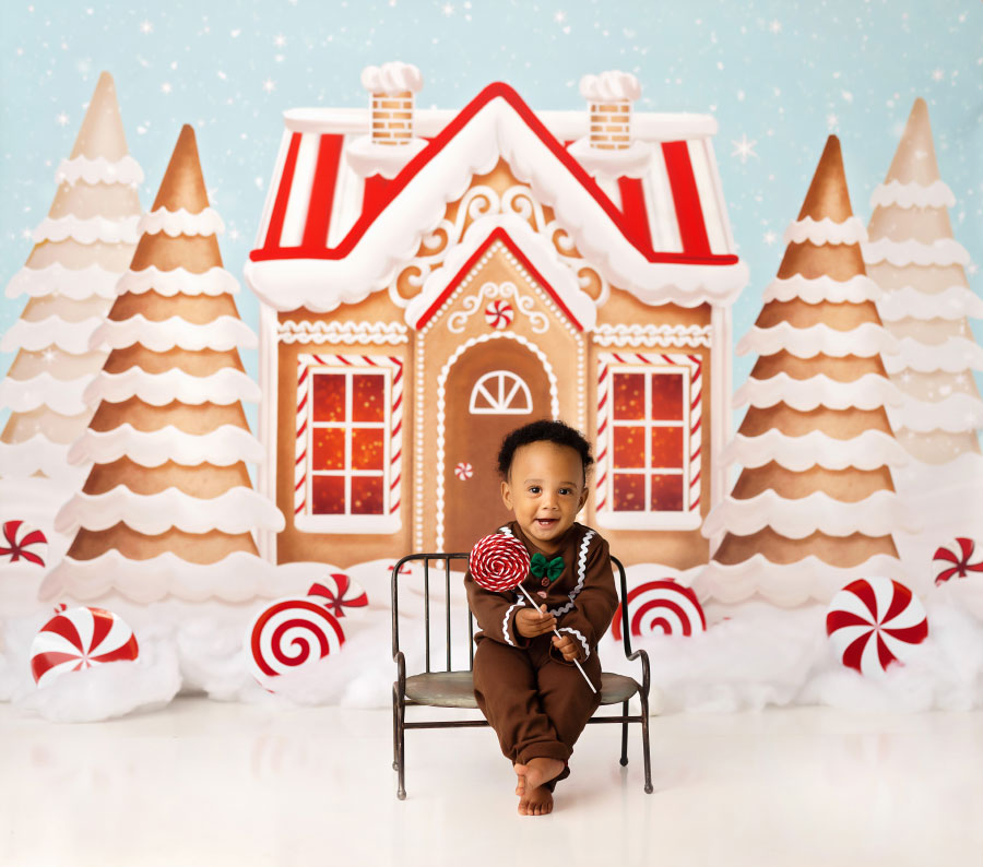 Douglasville baby photographer; gingerbread house Christmas backdrop