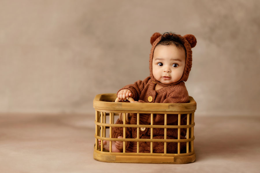 Douglasville baby photographer, six month milestone session with bear outfit