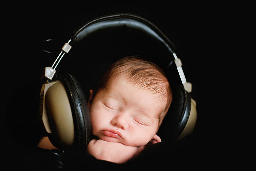 Mableton newborn photographer, baby boy wearing headphones