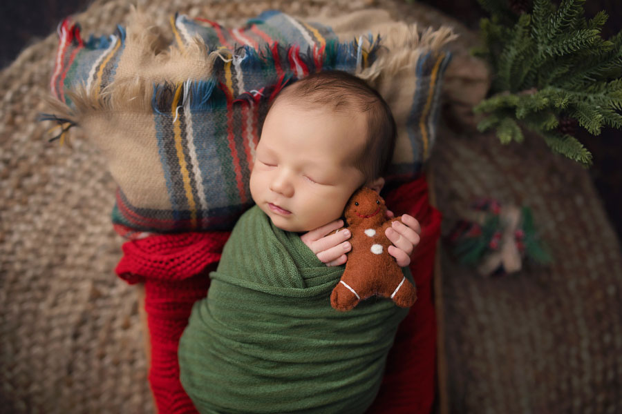 newborn photographer near Newnan, baby boy with gingerbread for Christmas