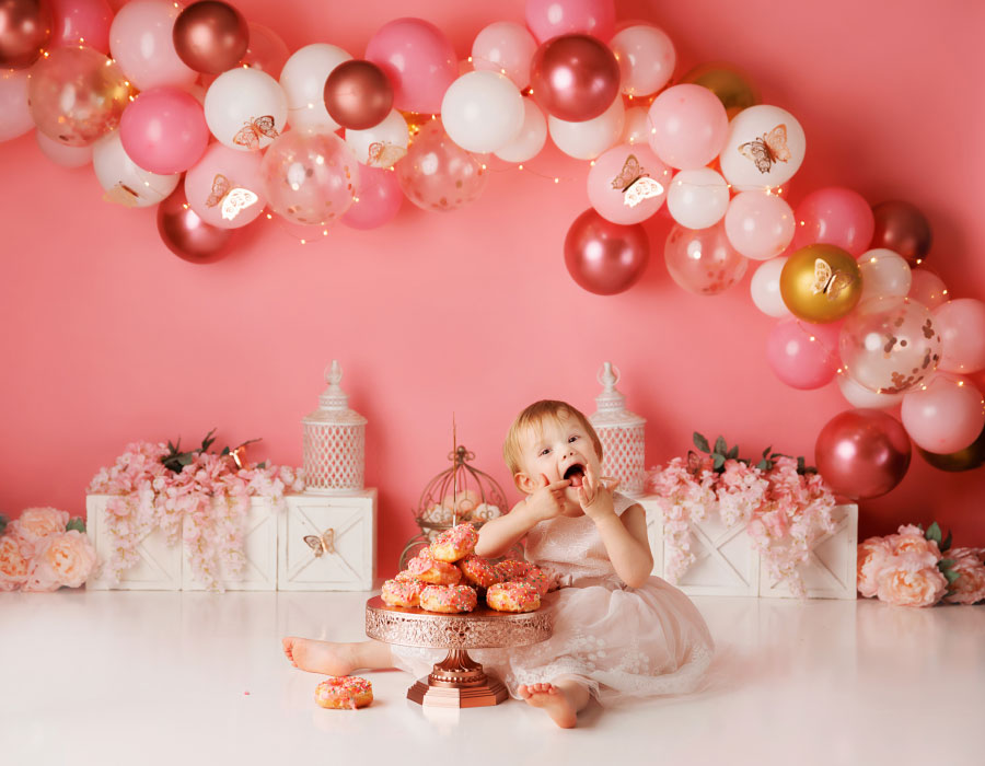 Newnan cake smash photographer, pink donut set for two year old