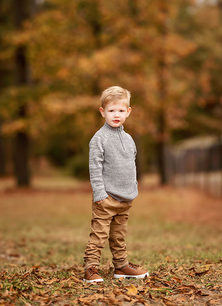 Newnan children's photographer, outdoor portrait by fall trees