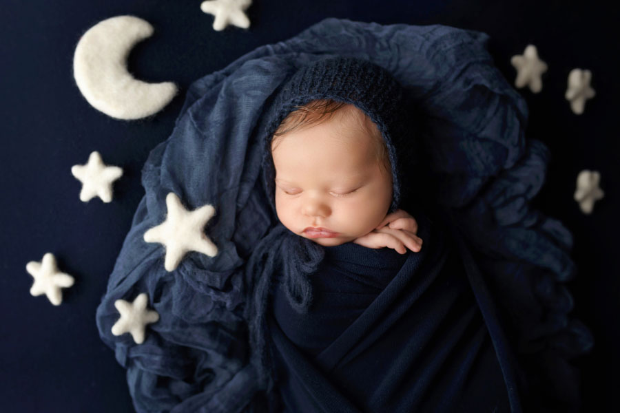 Tyrone newborn photographer, baby boy in blue with moon and stars