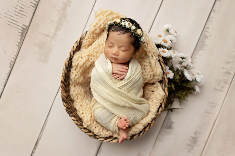 Tyrone newborn photographer, baby girl in yellow with daisies