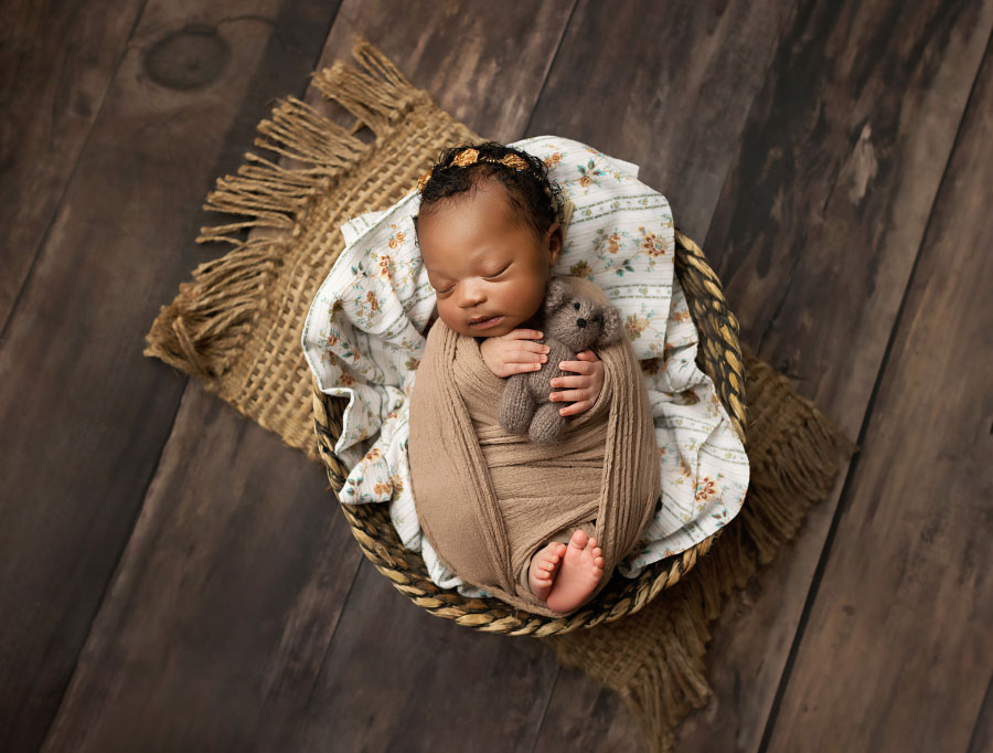 Villa Rica newborn photographer, baby girl in brown studio set with bear