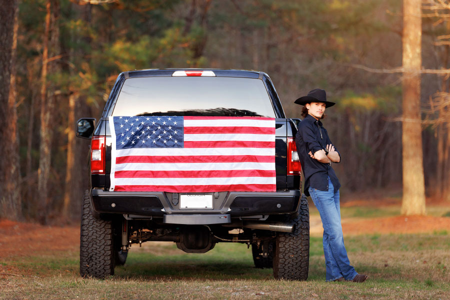 Villa Rica senior portrait photographer, teen with truck and American flag