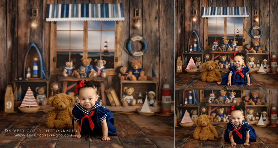 baby photographer near Dallas, GA; girl with teddy bear on nautical studio set