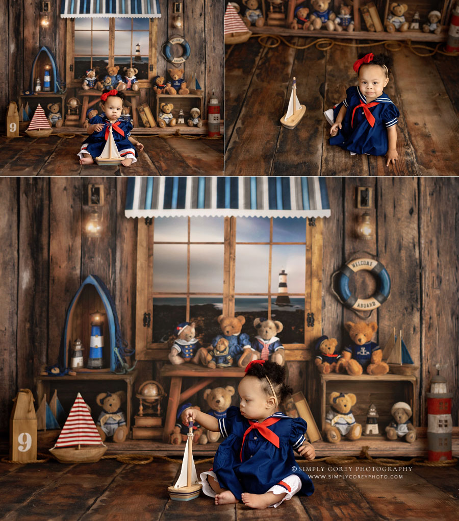 baby photographer near Hiram, girl with toy boat and nautical bear set