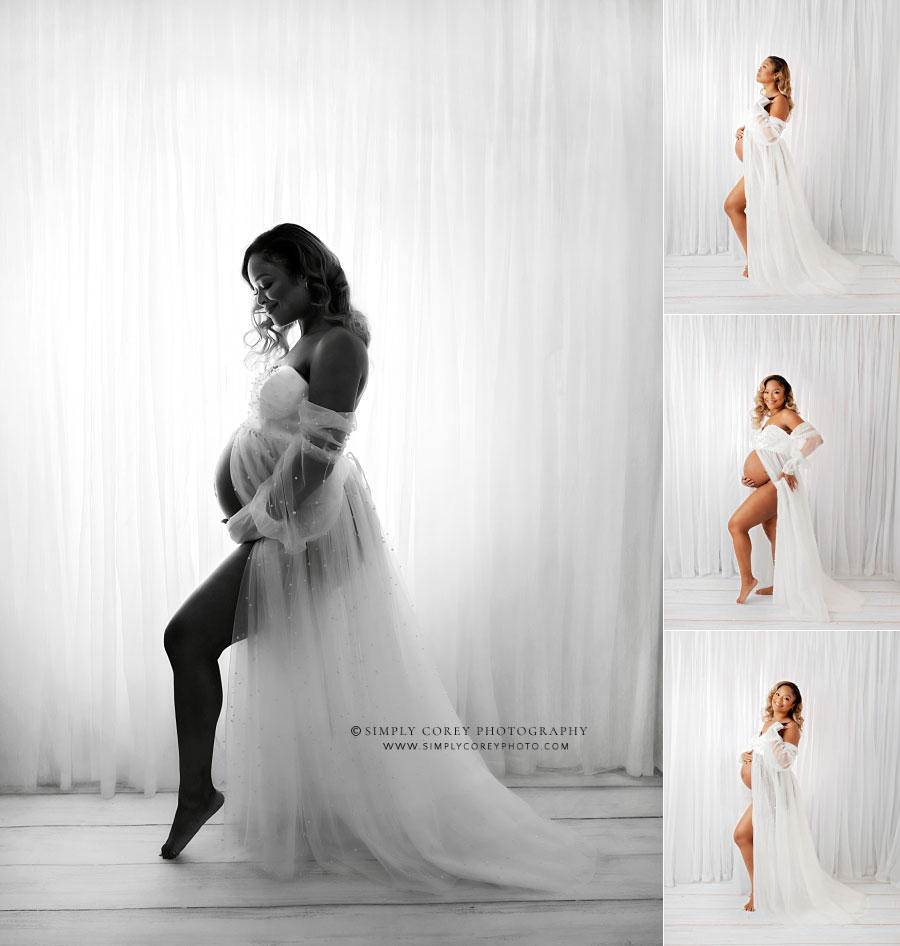 maternity photographer near Carrollton, GA; pregnant mom in white dress with white curtains in studio